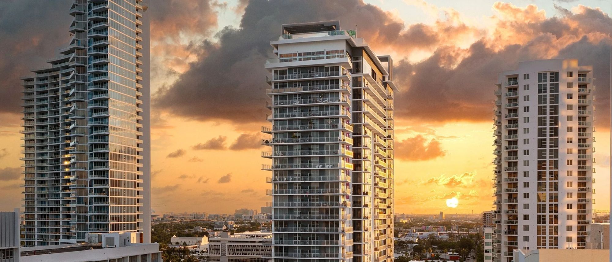 Waterfront towers at dusk, aerial